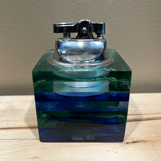 Vintage resin cube lighter.