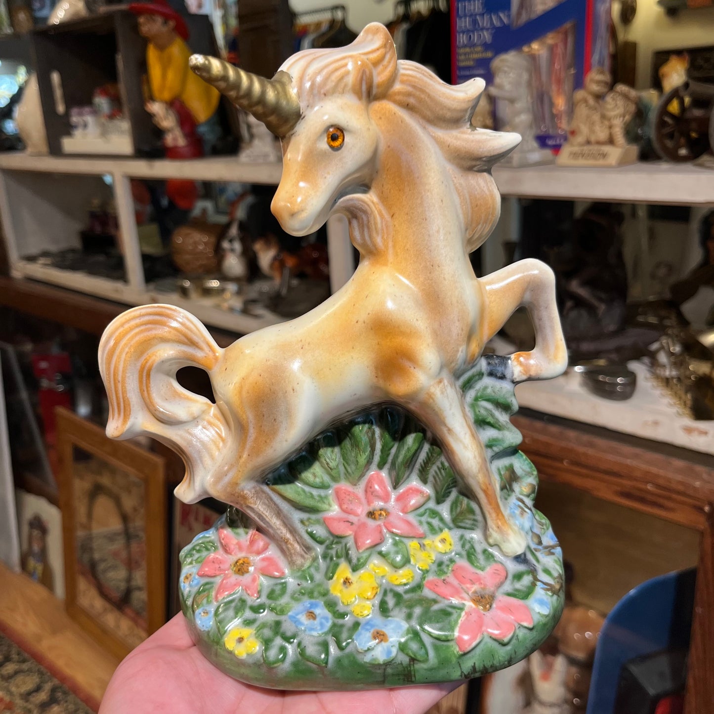 1981 Ceramic unicorn statue.