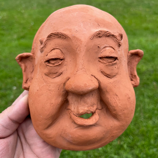 90s Clay demon sculture by Charlotte Burgess.