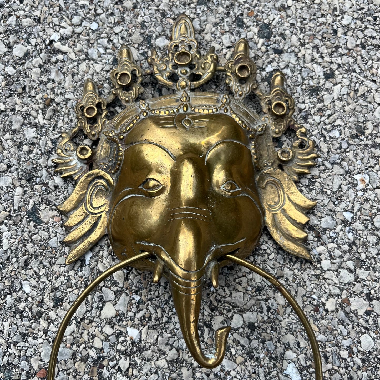 Vintage brass Ganesh cloth holder.