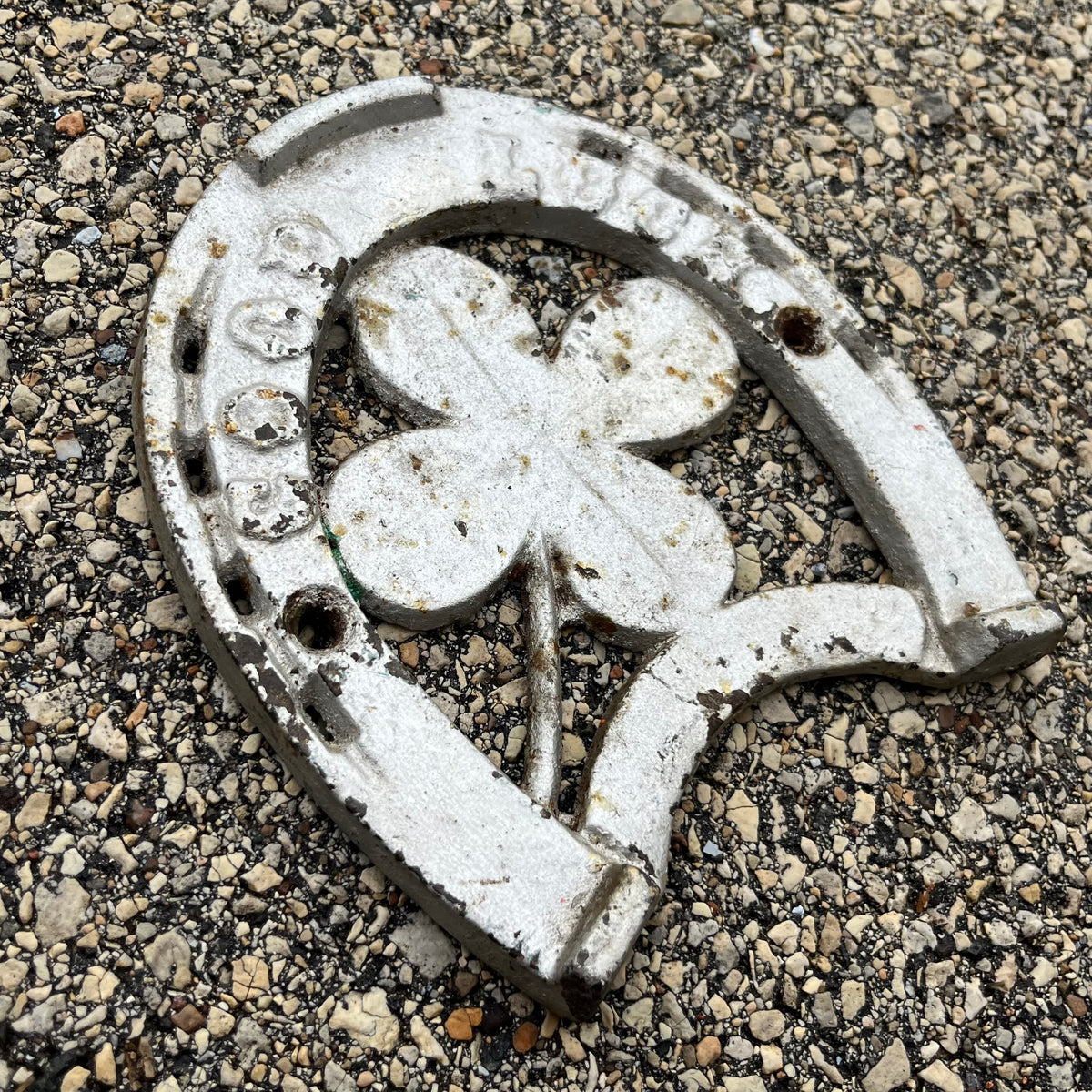 Vintage cast iron “Good luck” horseshoe.