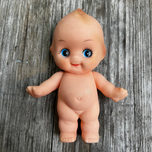 Vintage vinyl Kewpie.