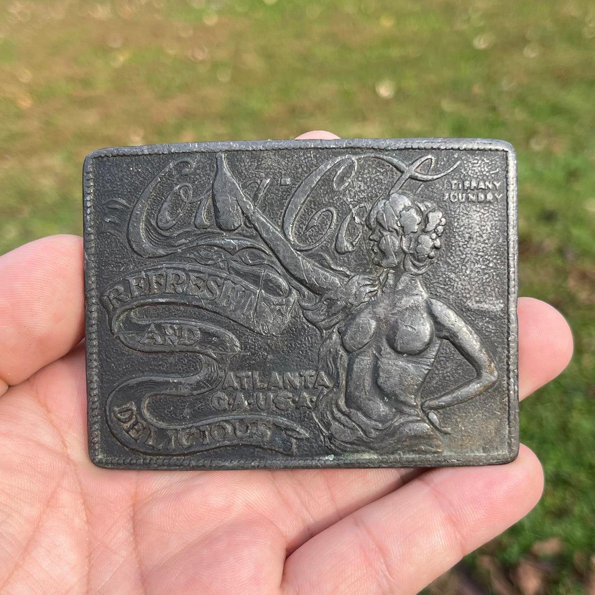 Vintage Coca-Cola belt buckle.