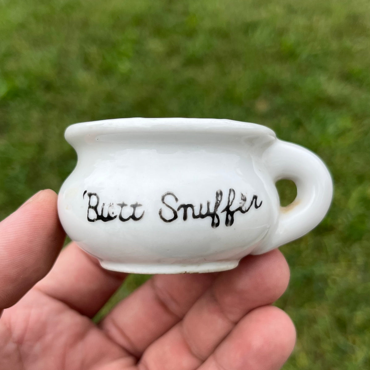 1950s Ceramic “Butt Snuffer” mug.