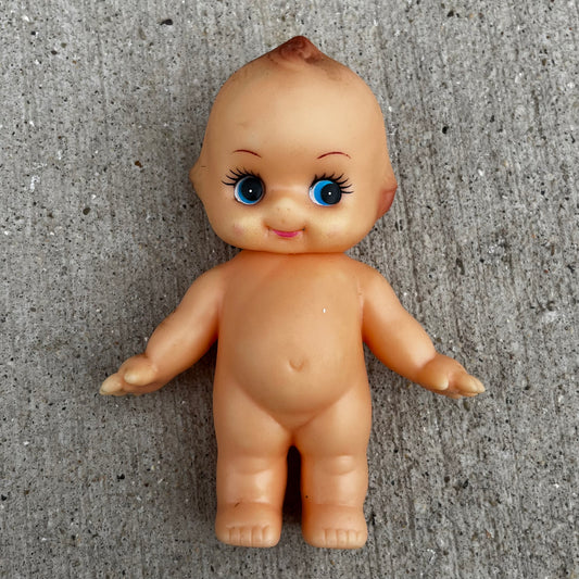 Vintage vinyl Kewpie doll.