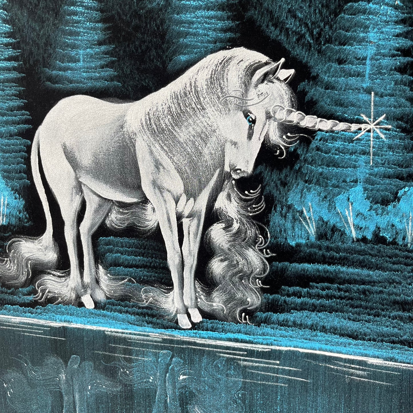 1970s Unicorn on black velvet.