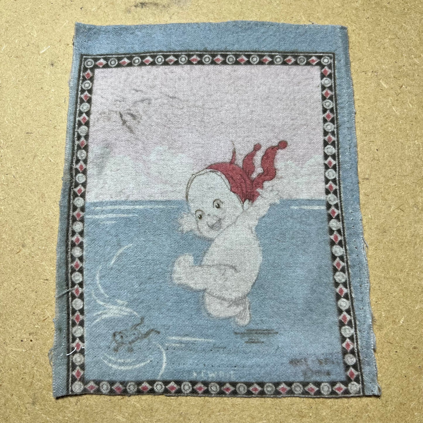 1914 Kewpie felt cloth.