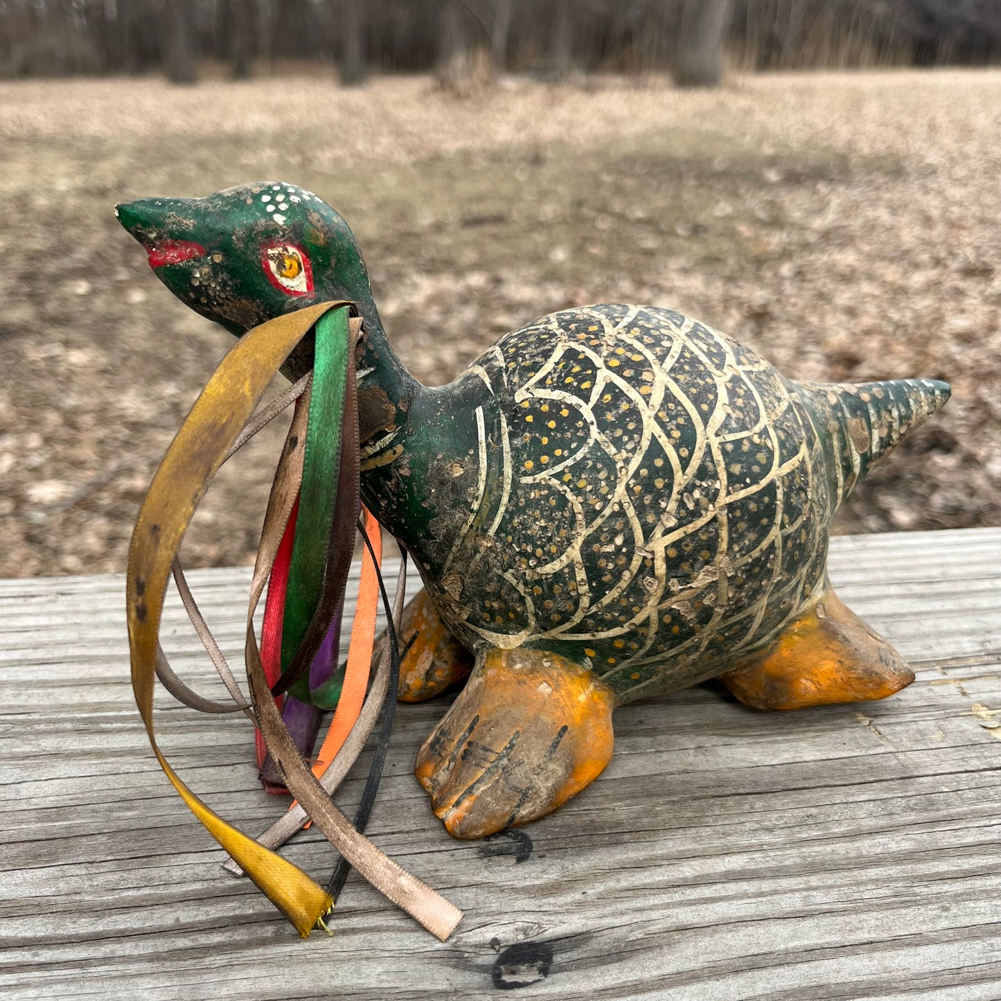 Hand crafted turtle gourd maraca.