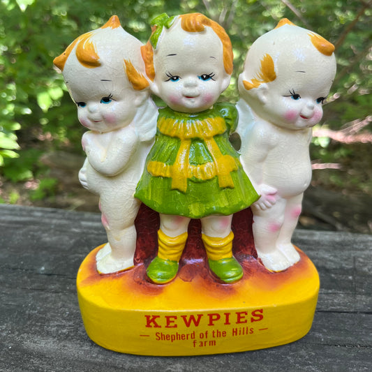 Vintage chalkware Kewpies.
