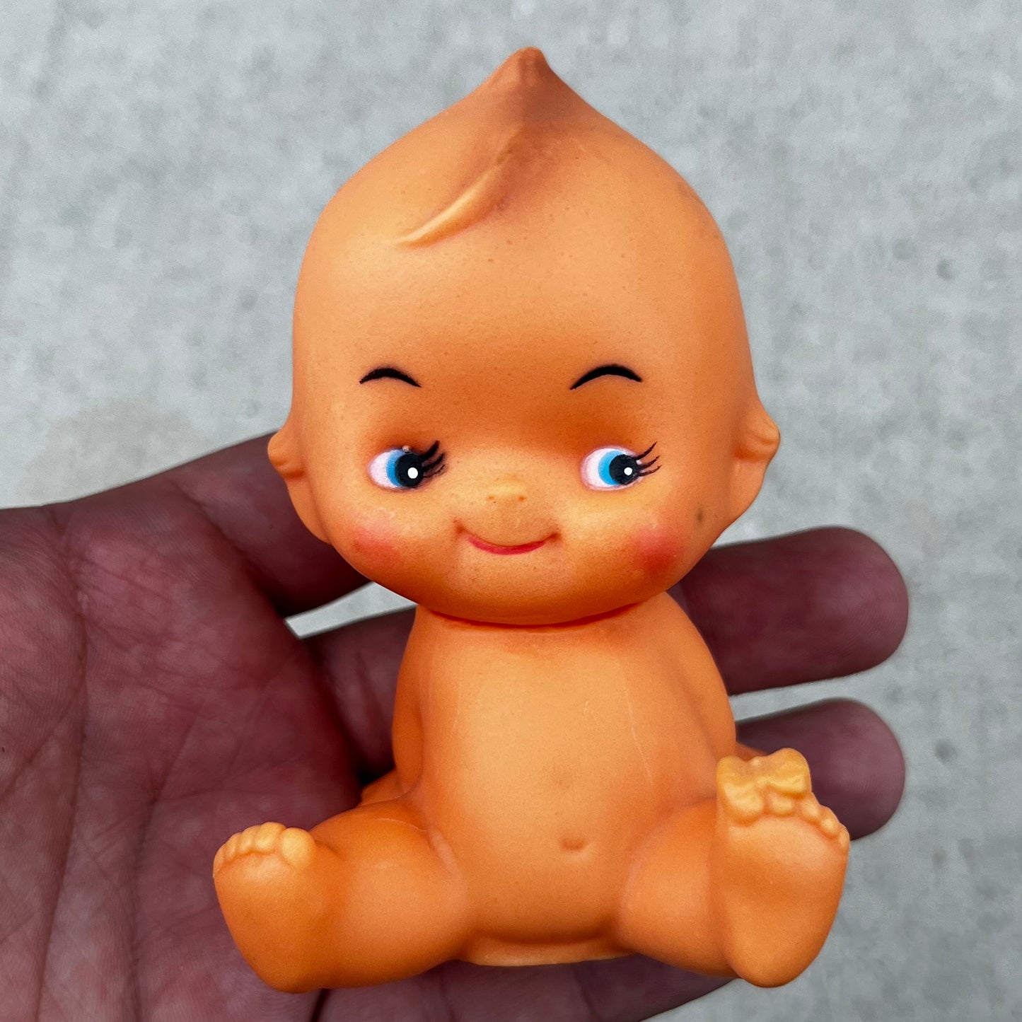 Vintage vinyl Kewpie doll.