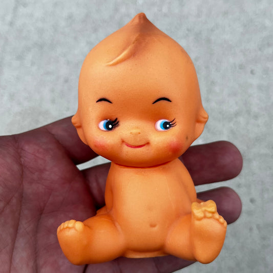 Vintage vinyl Kewpie doll.