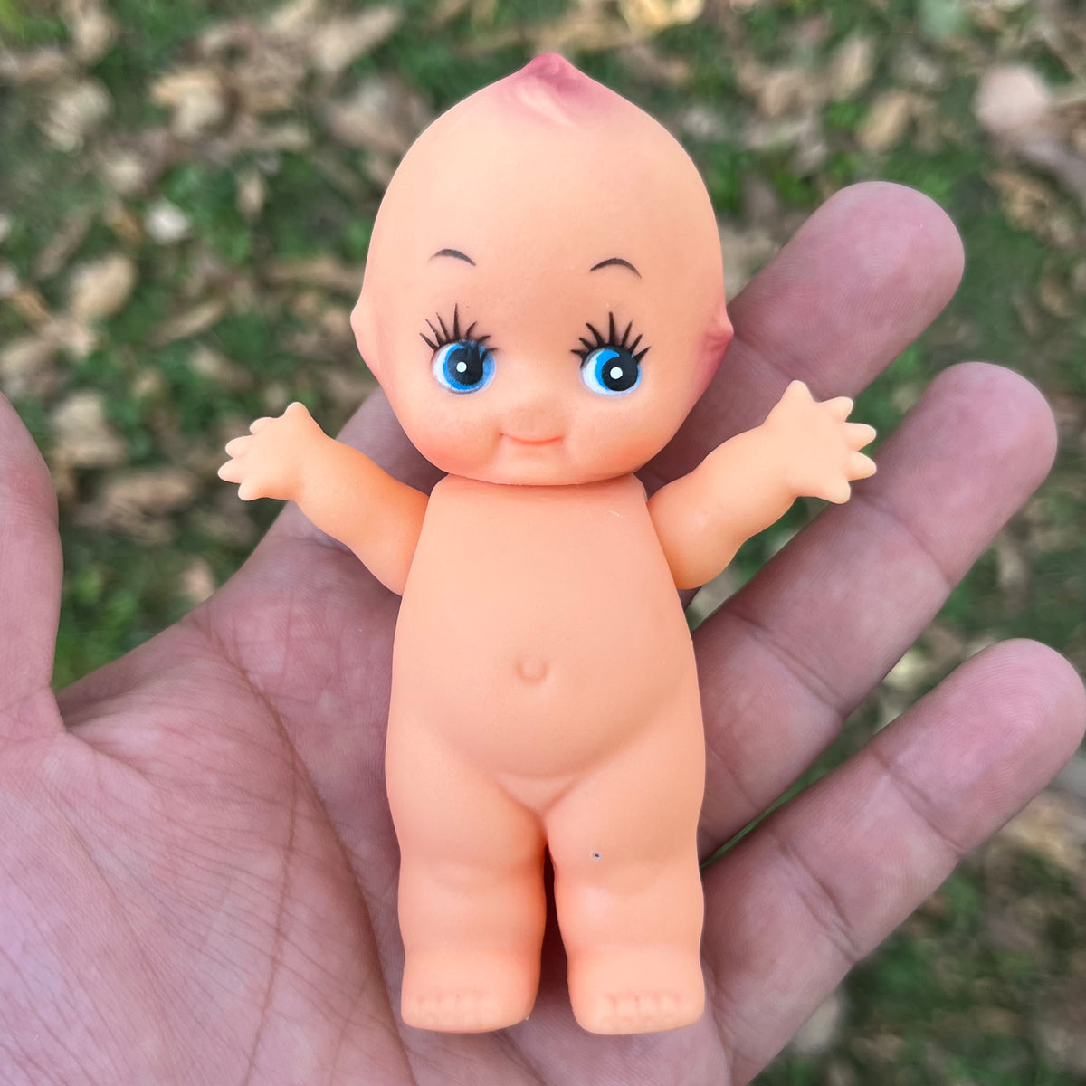 Vintage vinyl Kewpie.