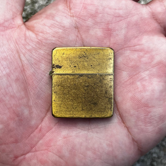 Vintage Brass flip lighter.