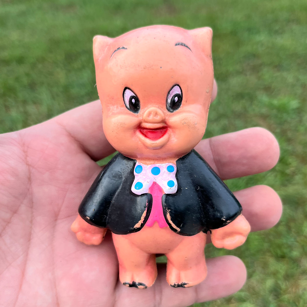 Vintage celluloid Porky the pig toy.