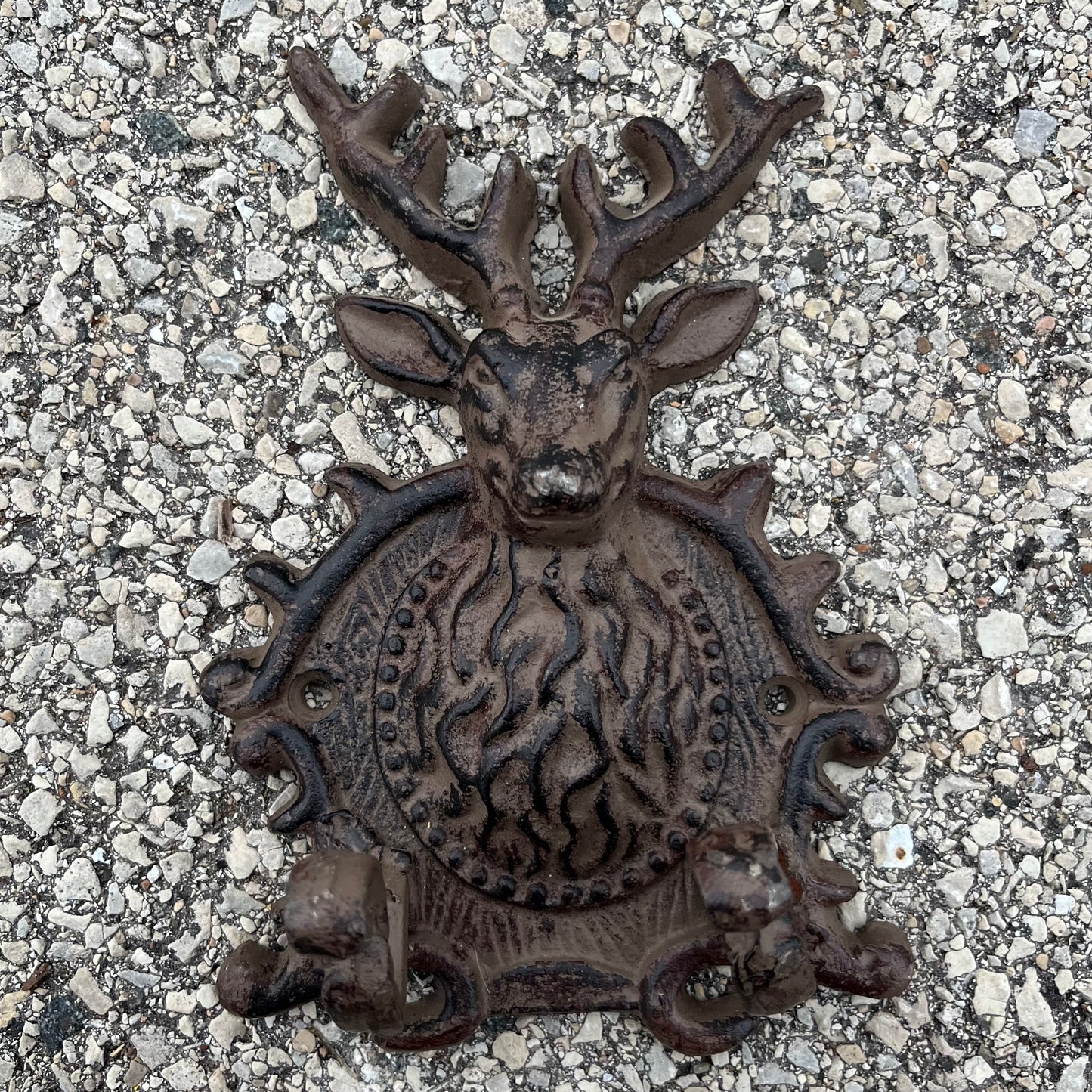Vintage cast iron deer hooks.