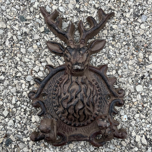Vintage cast iron deer hooks.