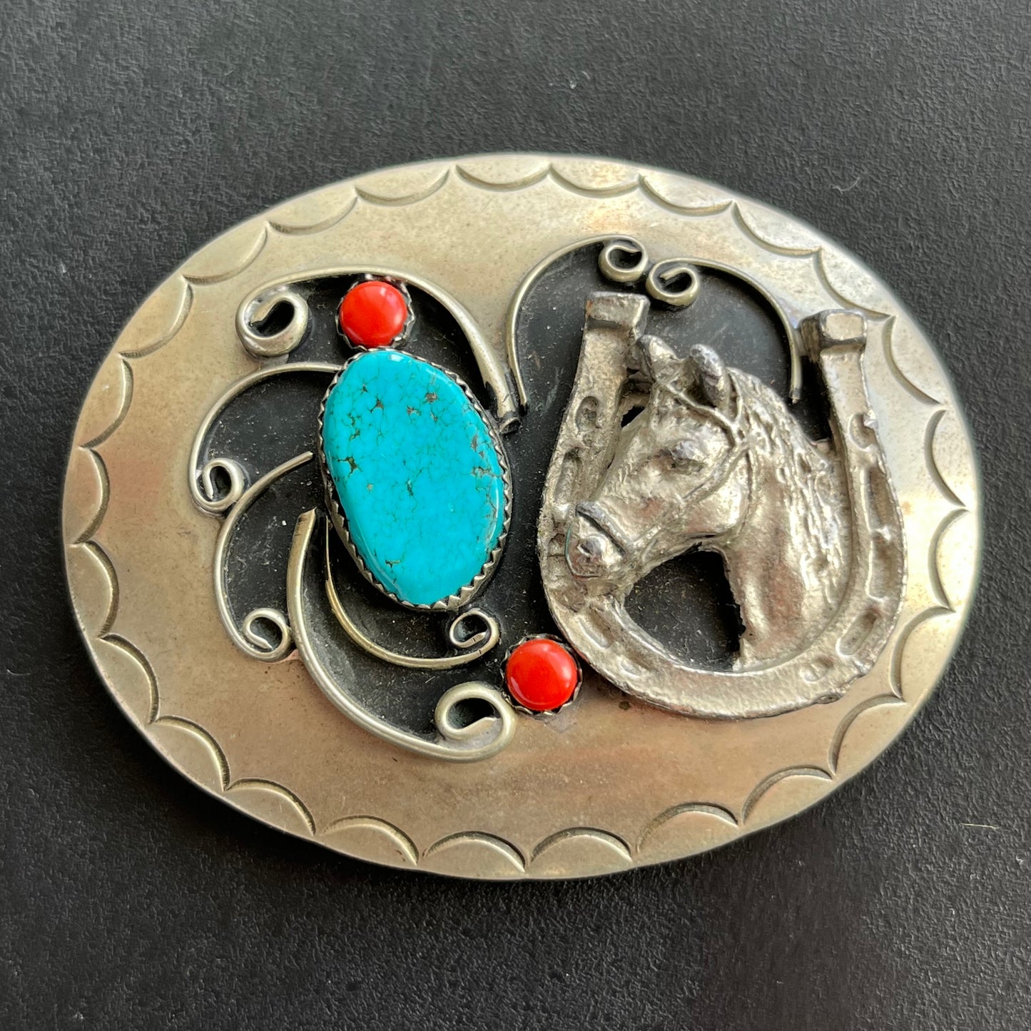 Vintage turquoise horseshoe belt buckle.