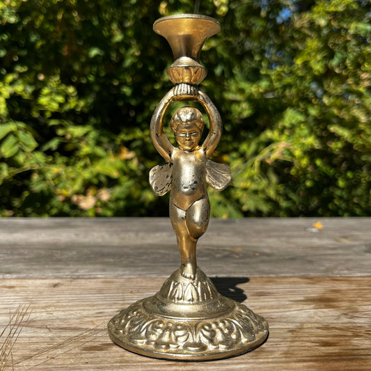Vintage pewter fairy candlestick holder.