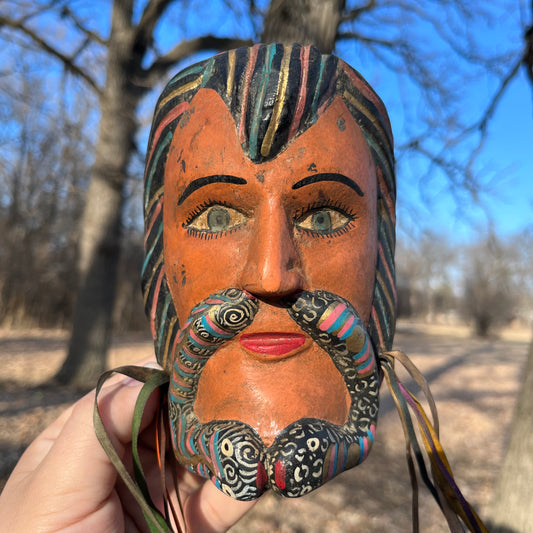 Vintage decorative Spaniard wood carving.