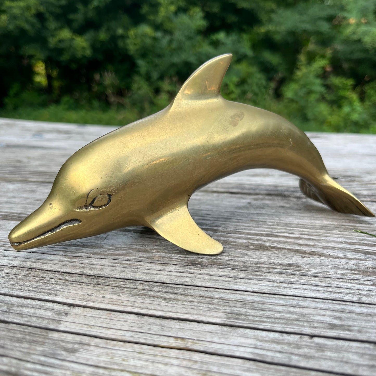 Vintage brass dolphin.