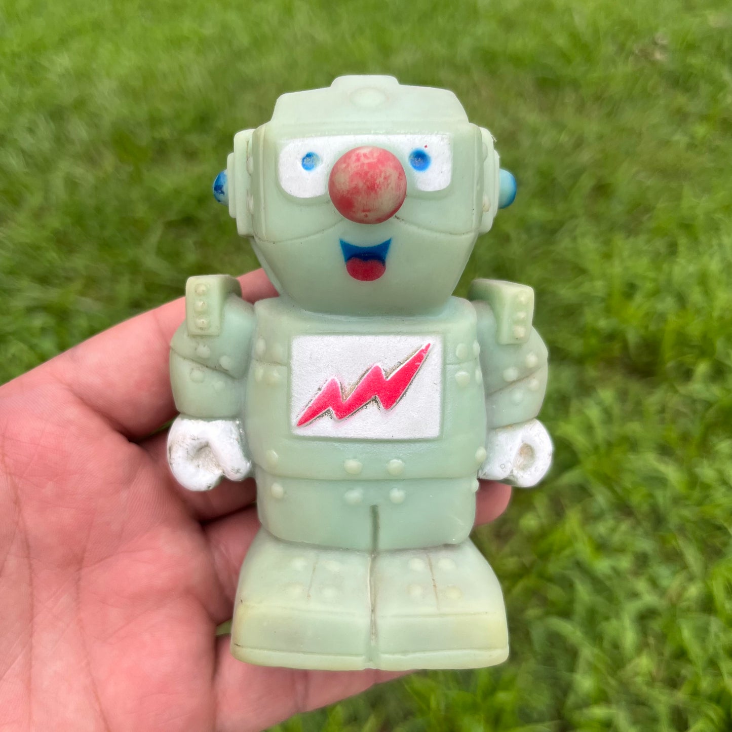 Vintage vinyl robot squeaker toy.