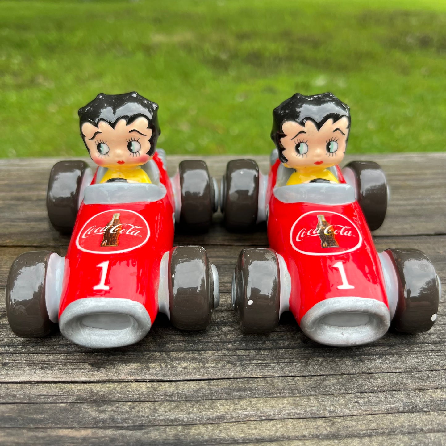 Y2K Betty Boop racecar salt n' pepper shakers.