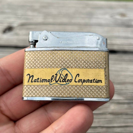 Vintage National video corporation flat lighter.