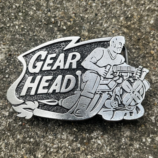 1979 Gear head belt buckle.