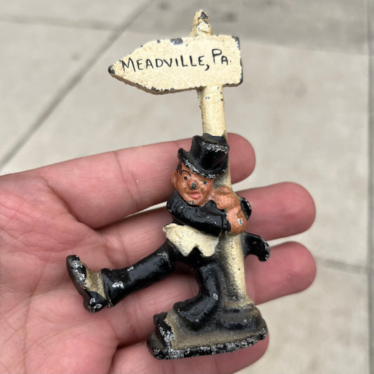 Vintage cast iron drunkard.