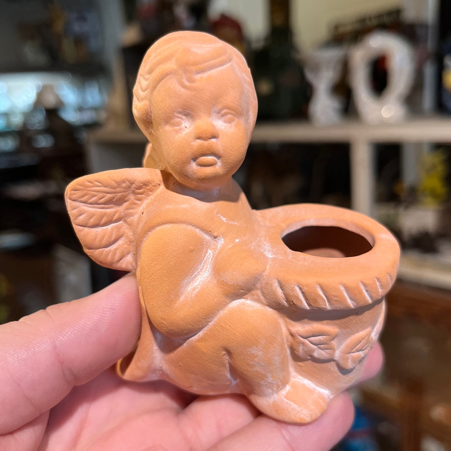 1998 Clay Cherub candle holder set.