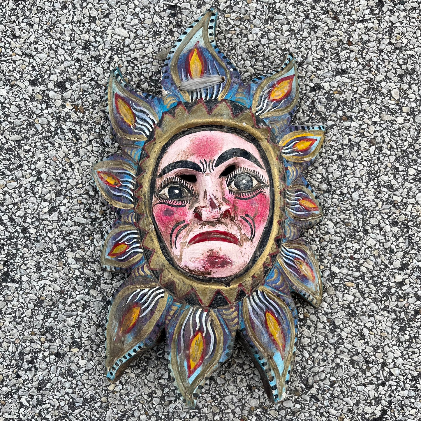Vintage hand crafted sun mask.