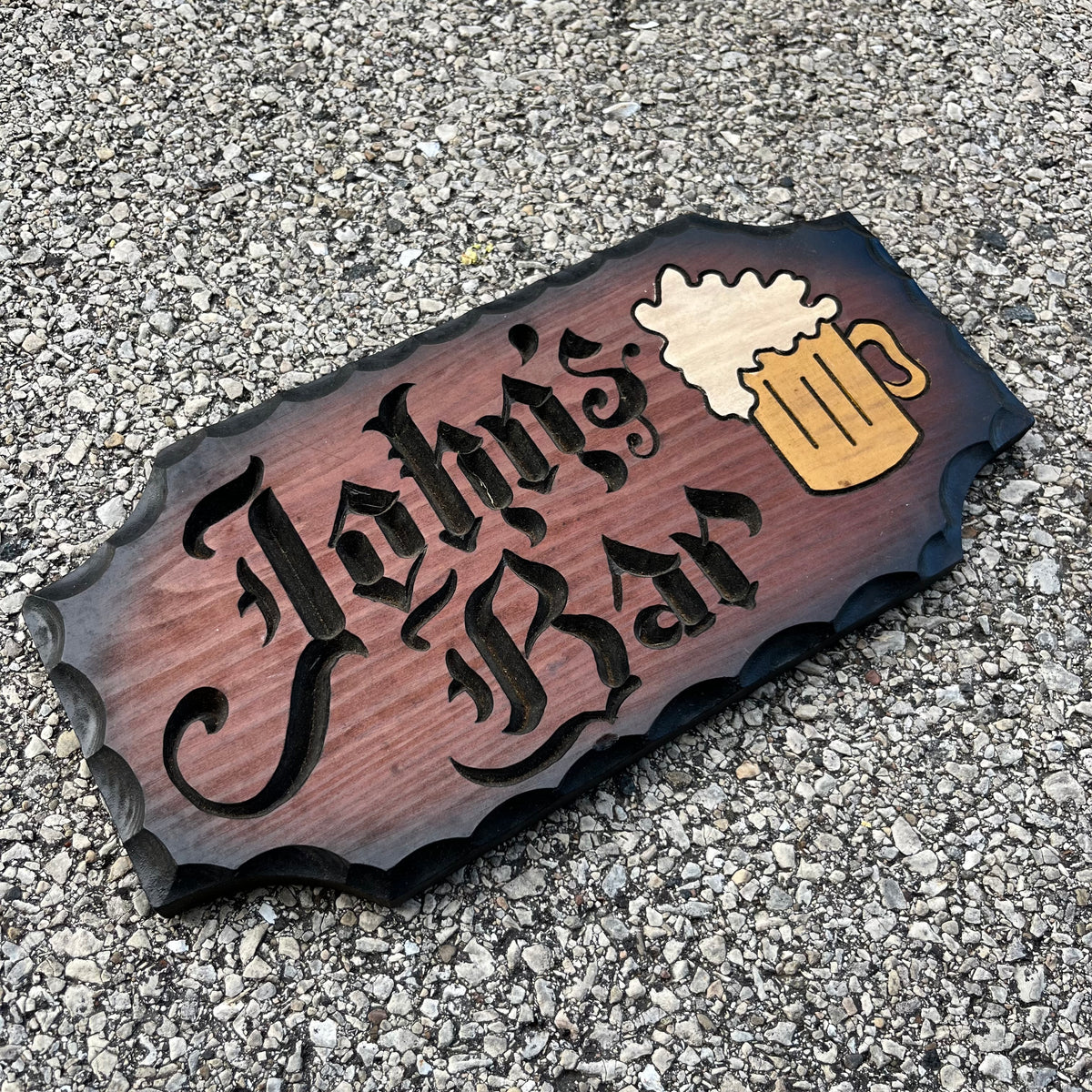 Vintage wood cut “John’s Bar” plaque.