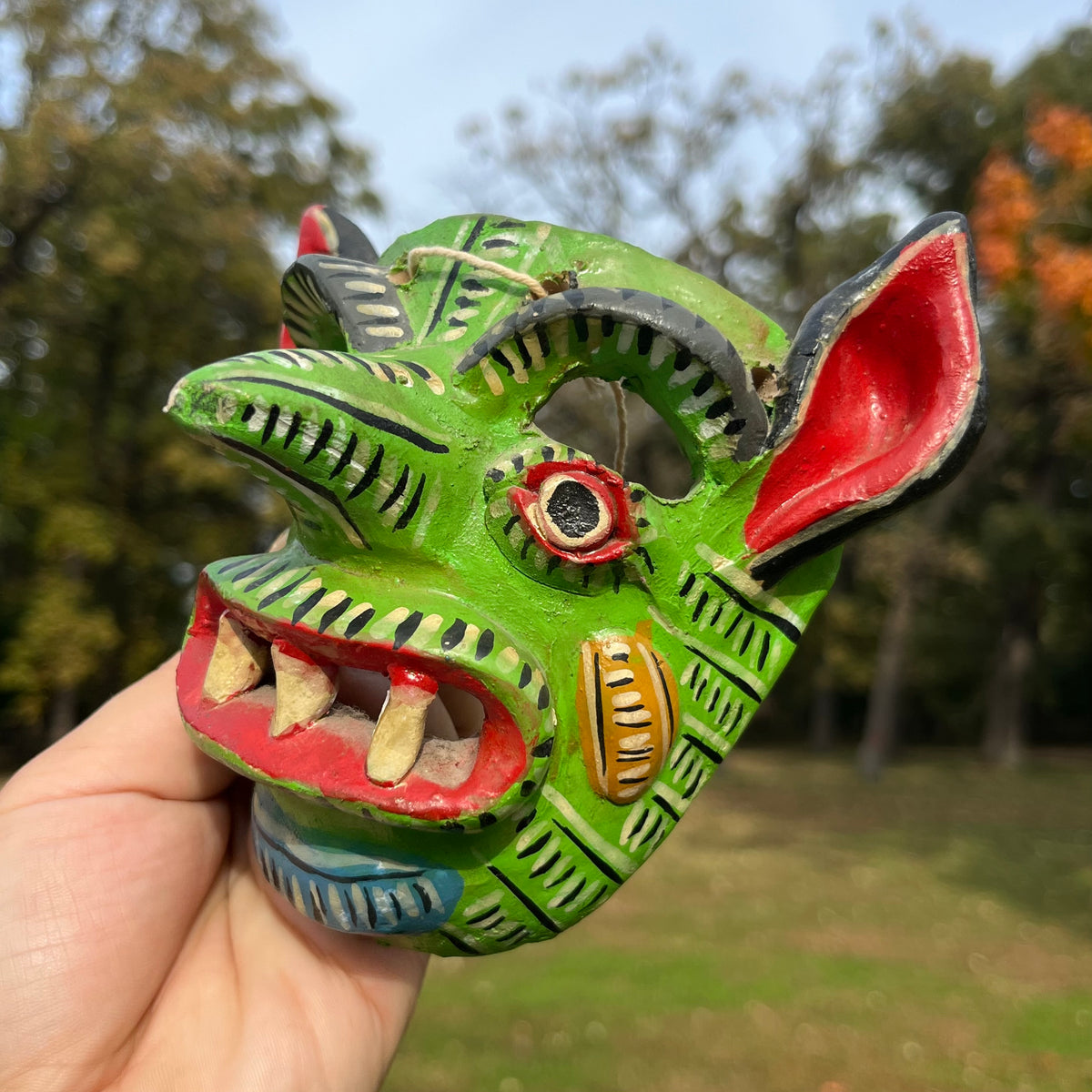 Vintage hand crafted green Diablo mask. (Chipped nose)