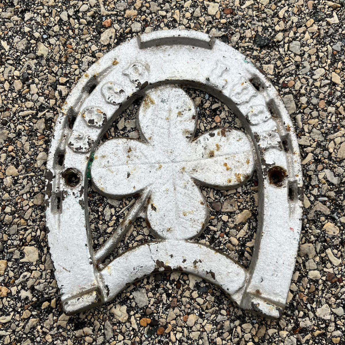 Vintage cast iron “Good luck” horseshoe.