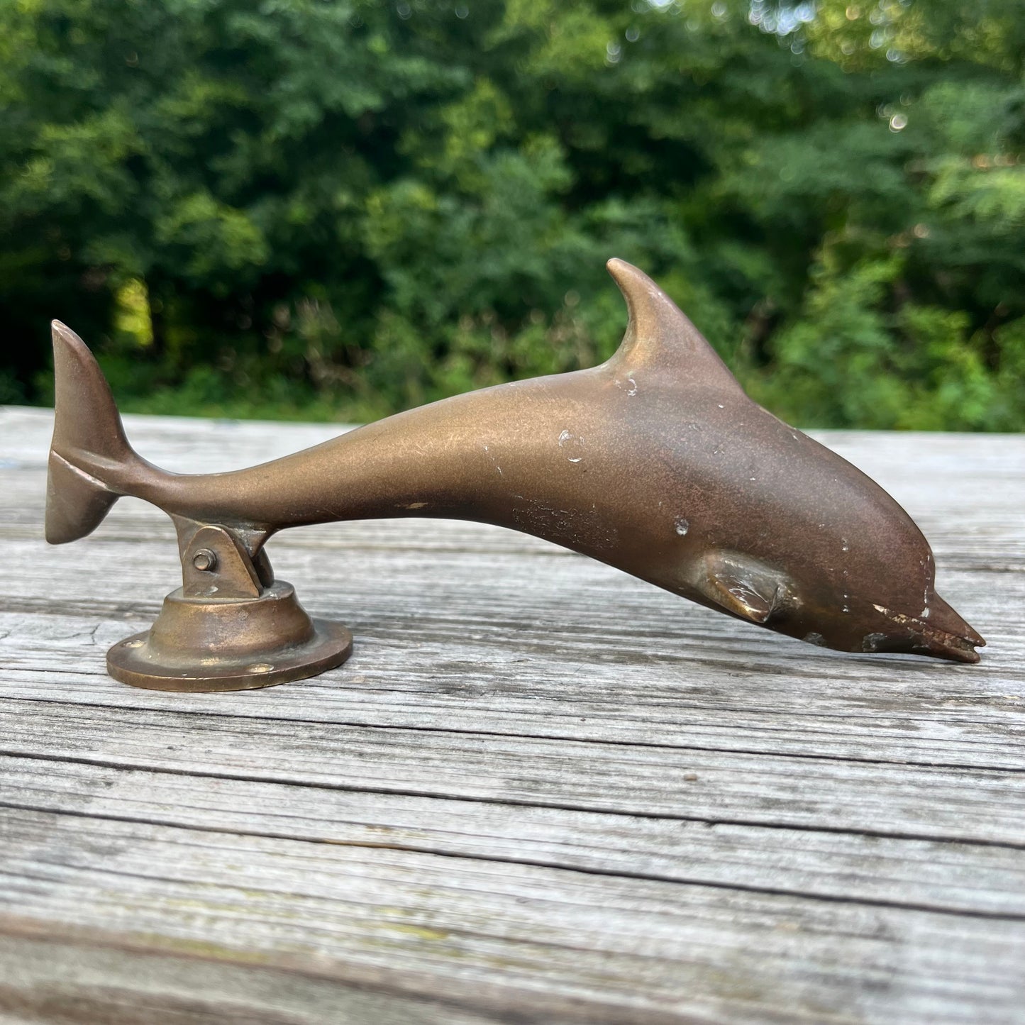Vintage brass dolphin door knocker.