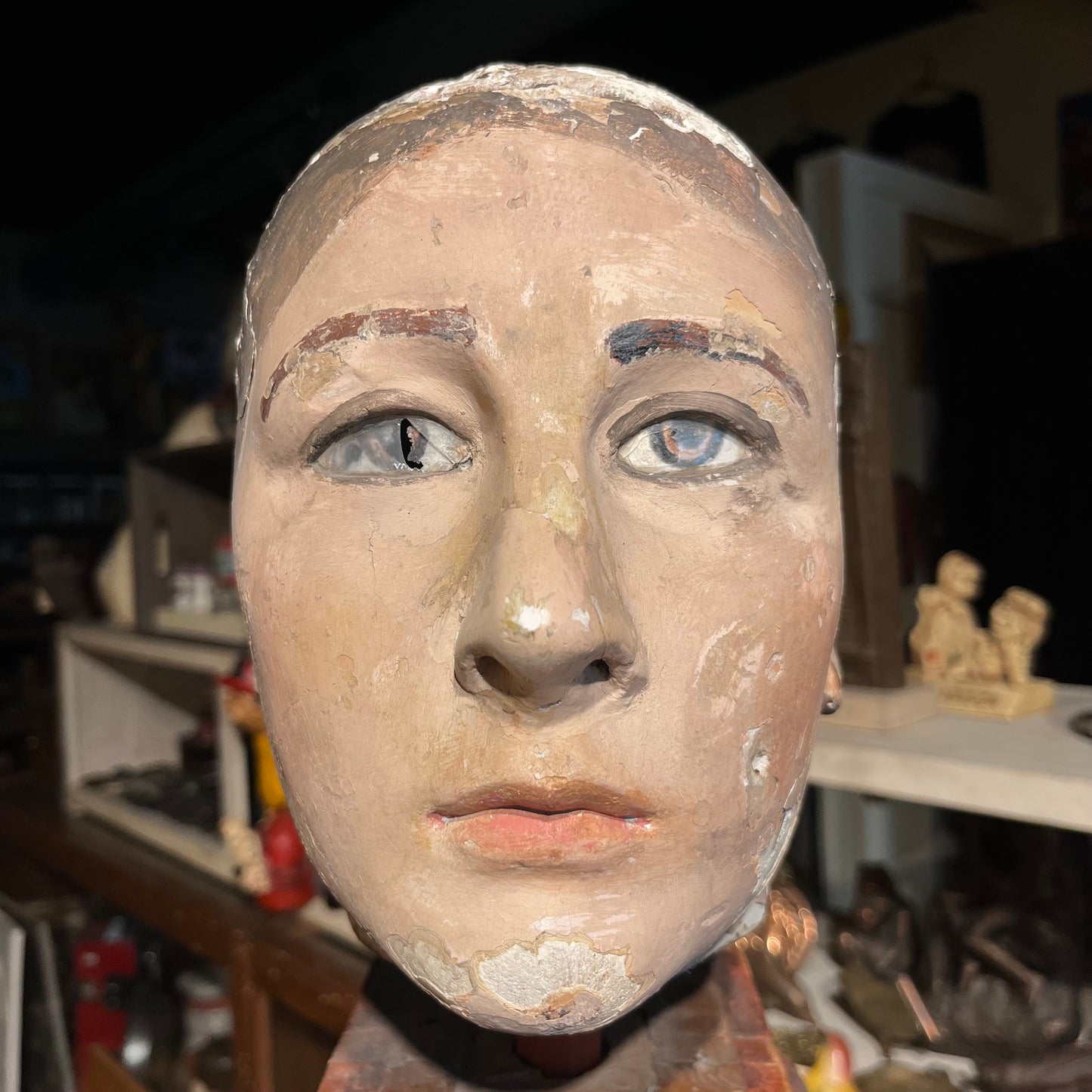 Early 1900s wooden mannequin head.