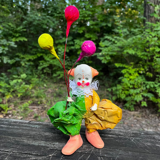 Vintage paper mache clown.