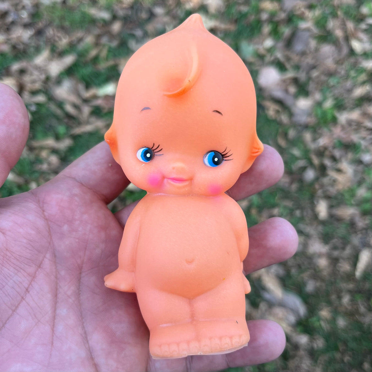 Vintage vinyl Kewpie.