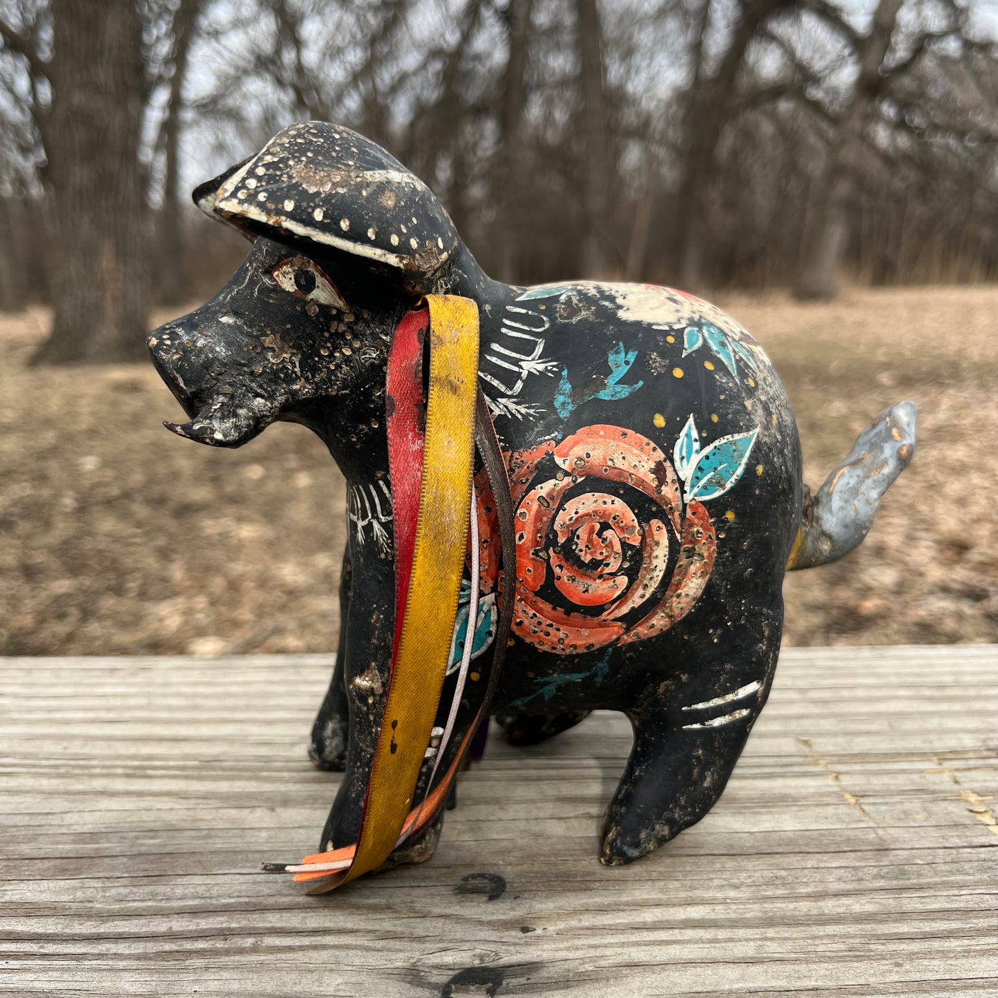 Hand crafted boar gourd maraca.