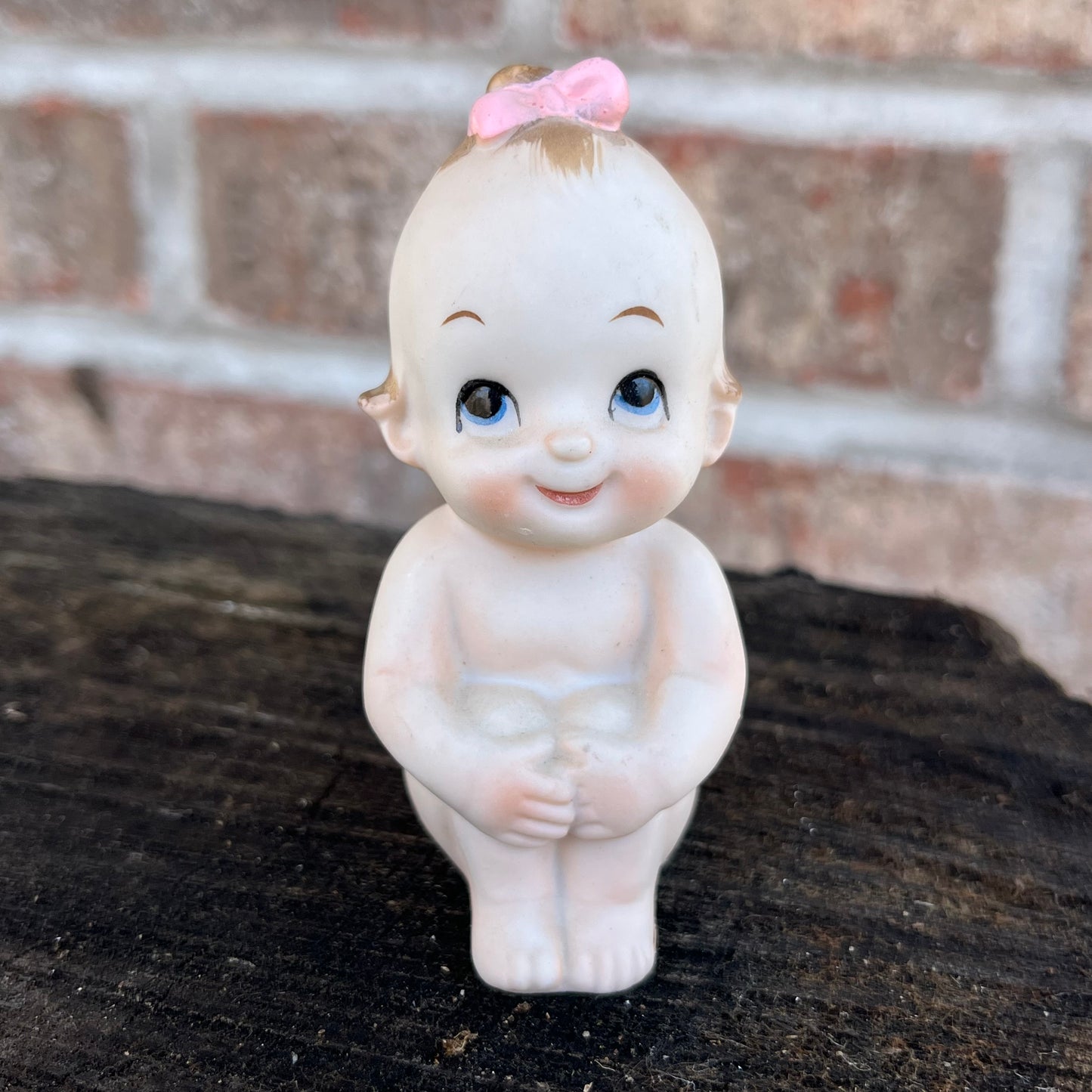 Vintage pink bow Kewpie.