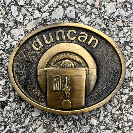 Vintage Duncan parking meter belt buckle.