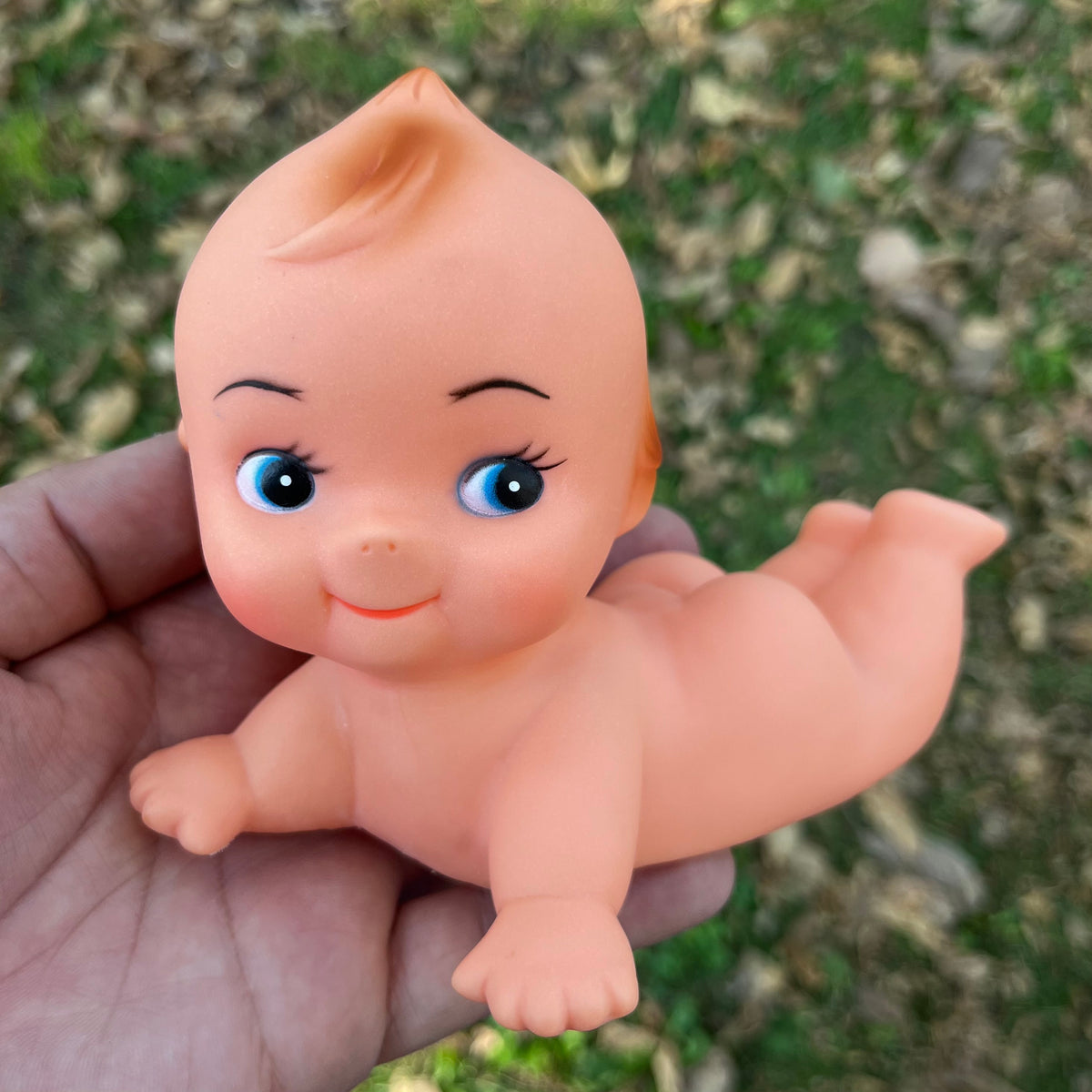Vintage vinyl Kewpie.