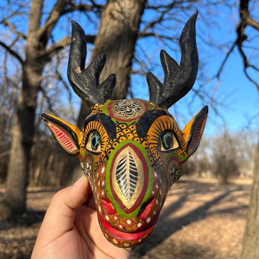 Vintage decorative deer wood carving.
