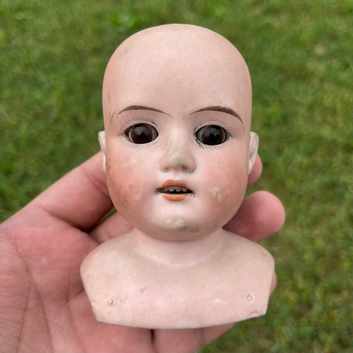 Vintage bisque doll head.