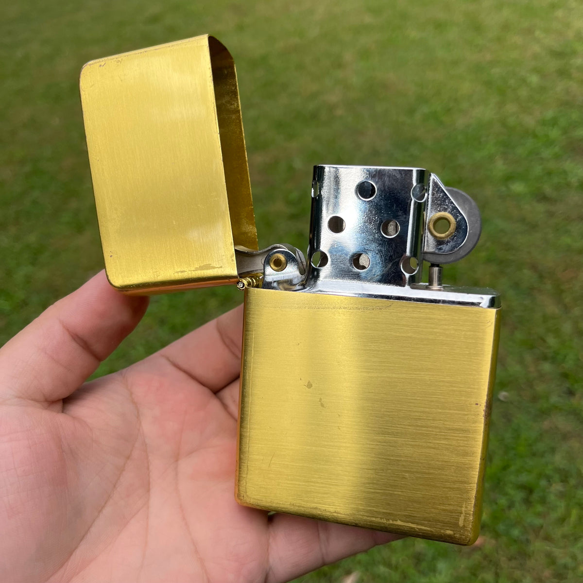 Vintage oversized flip lighter.