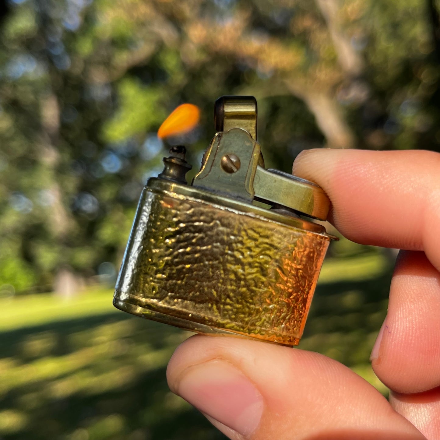 1950s Gold tone Penguin lighter.