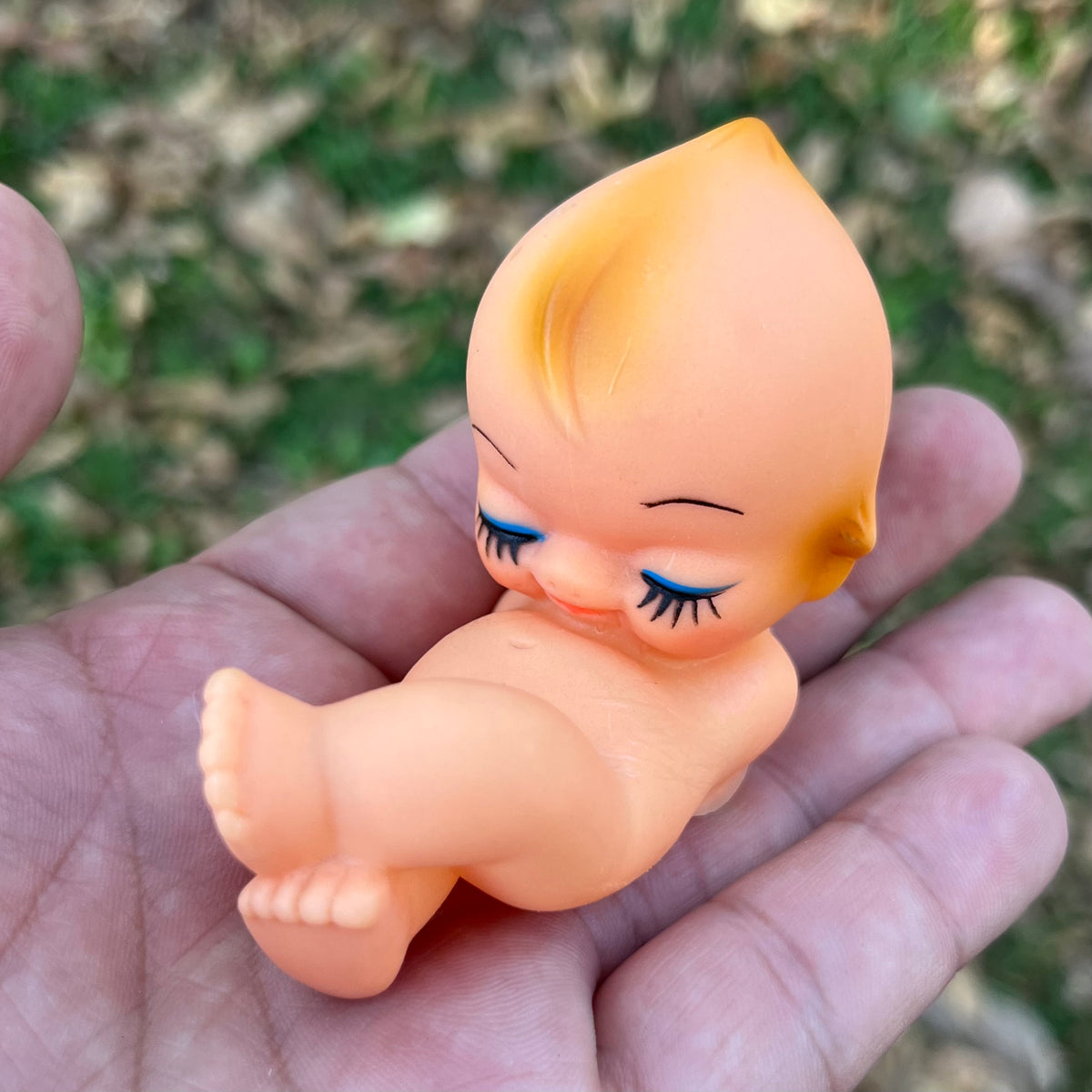 Vintage vinyl sleepy Kewpie.