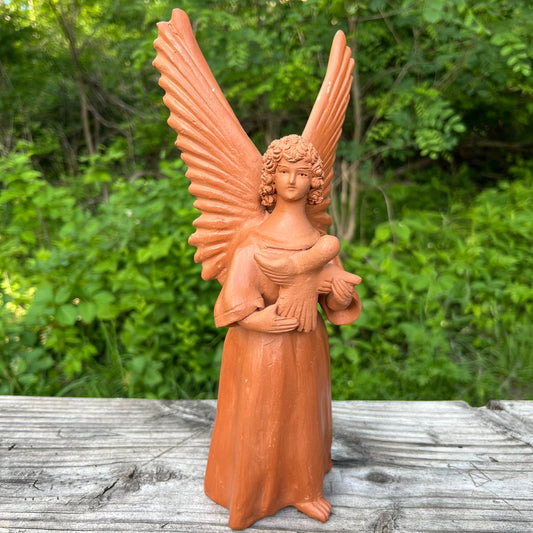 Vintage clay angel candle holder.