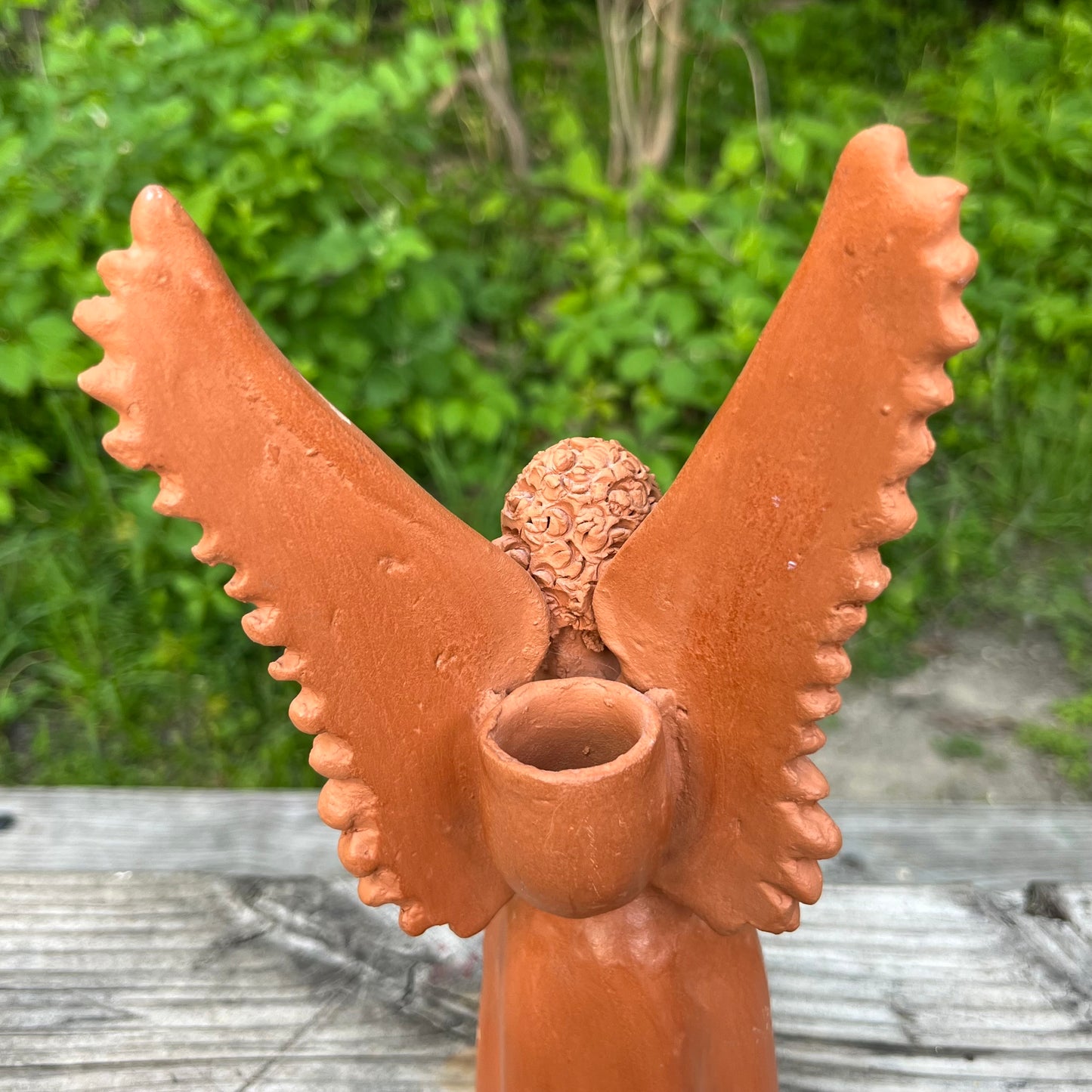 Vintage clay angel candle holder.