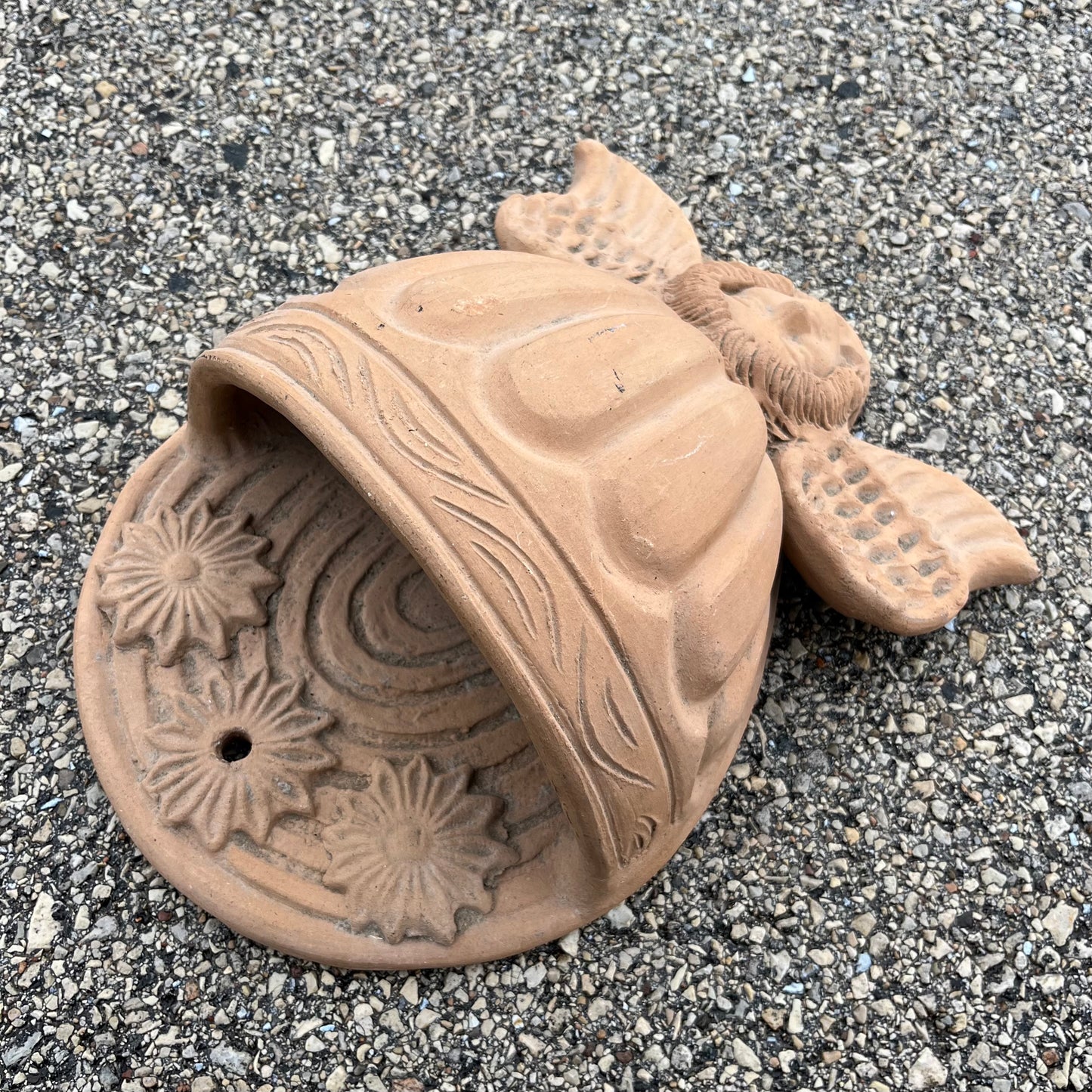 Vintage clay cherub wall planter.